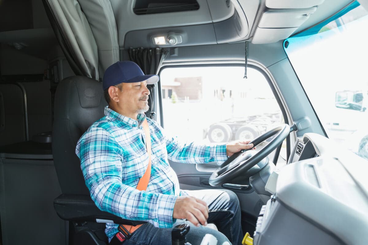 hispanic-man-operating-a-semi-truck-owner-operator-insurance.jpg