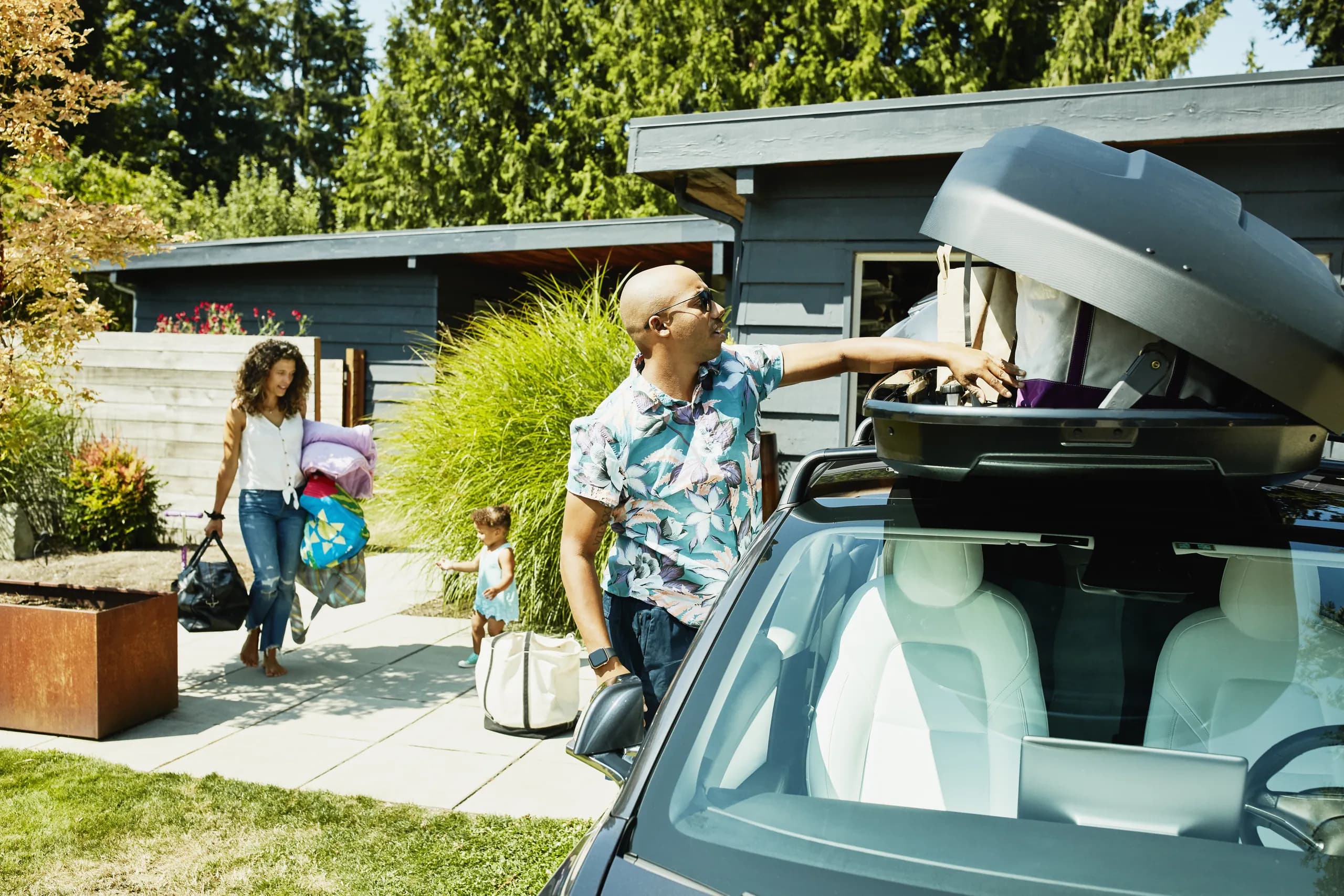 Family packing car for trip