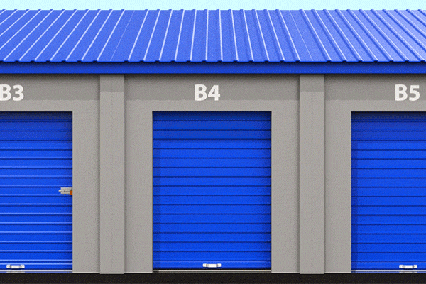 Empty storage unit being filled with miscellaneous items.